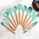 14-piece kitchen utensil set with heat-resistant silicone heads and holder, turquoise
