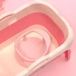 Anti-roll baby bath in pink