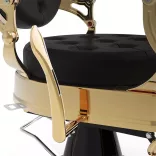 Vintage barber chair, black-gold